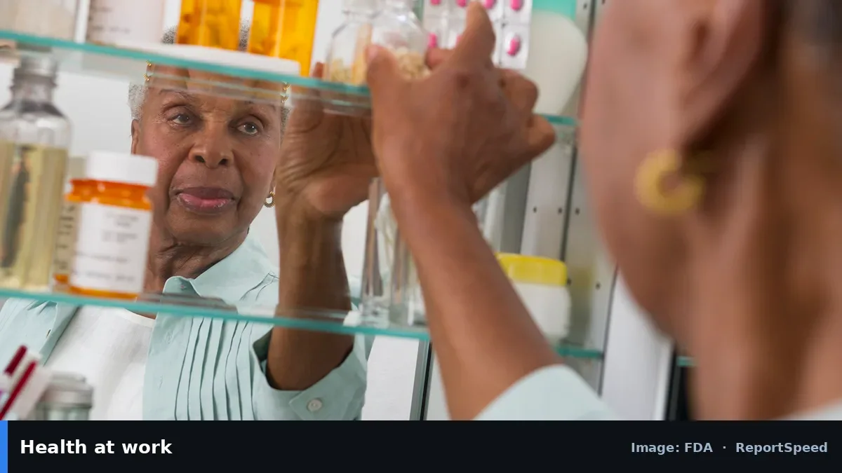 FDA photo of a woman at a medicine cabinet (FDA official image), annotated: Health at work